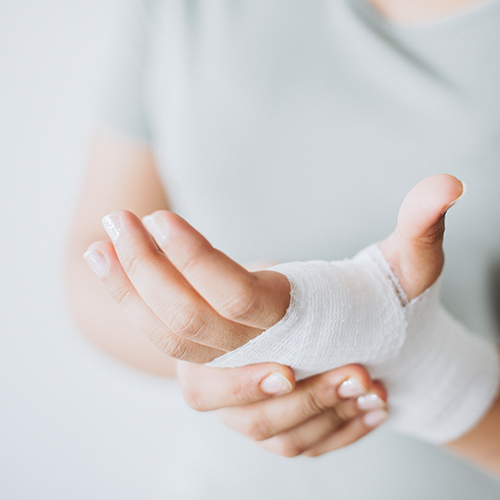 Girl with bandage on her arm